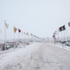 A view down the Flag Road at Oceti Sakowin, where flags from some of the 250 tribes who joined the water protectors are displayed.